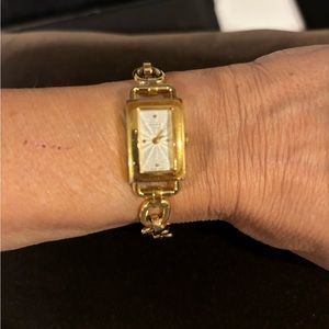 Coach watch bracelet and necklace. Gold tone